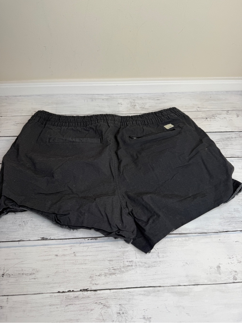 Vuori Black lightweight shorts with frayed hem